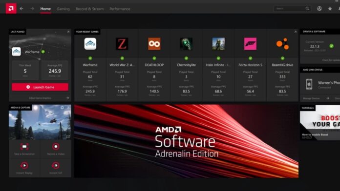 Laptop screen showing AMD Adrenalin Software updating GPU drivers